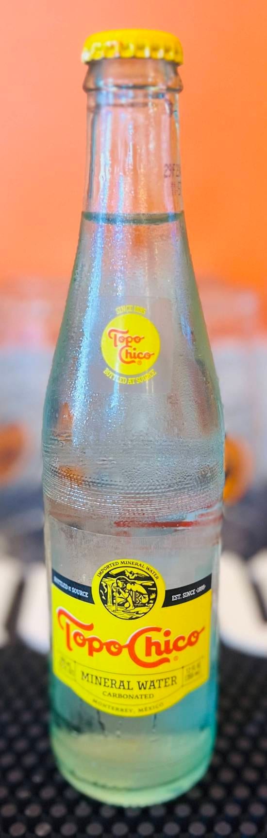 Topo Chico Mineral Water.