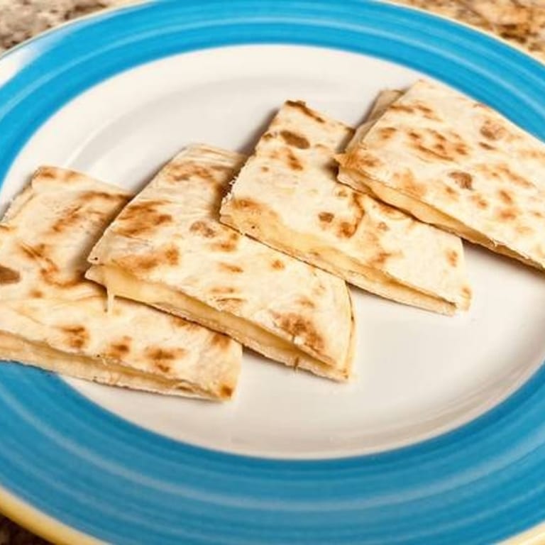Indulge in Our Quesadilla